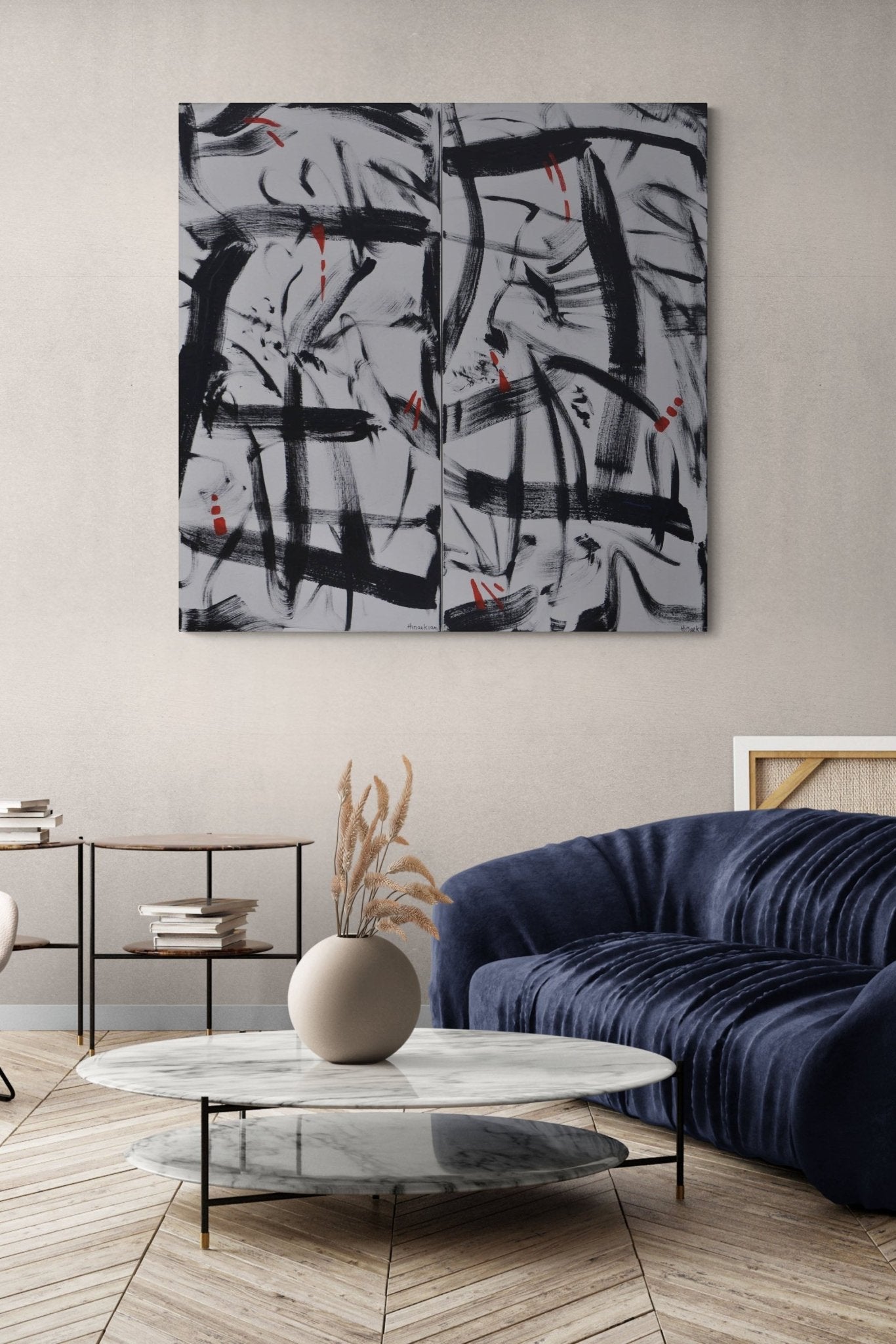 Abstract Painting, bold black & hints of red add contrast to this natural living room