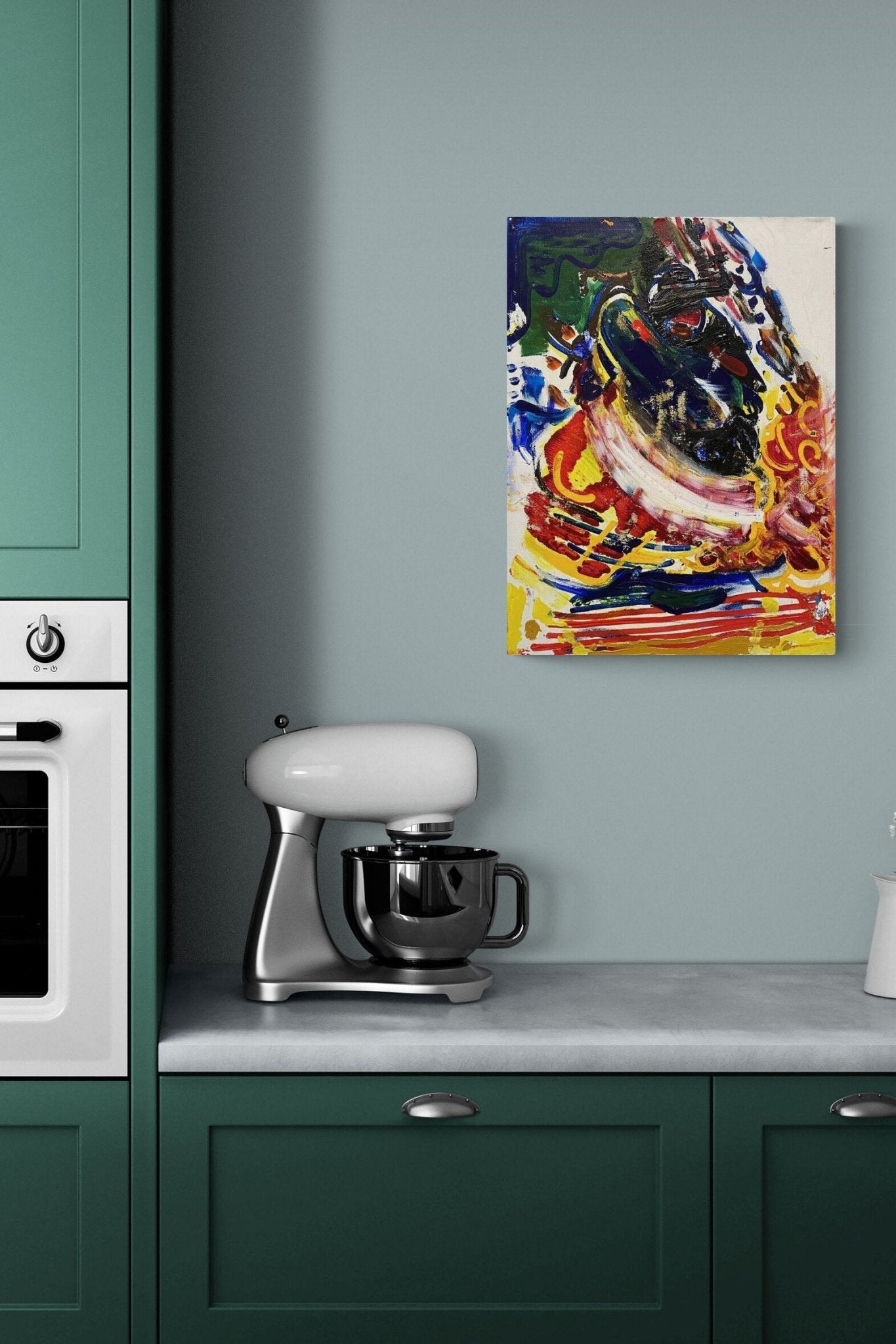Bold Abstract Art with red, yellow & blue adds conversation to this kitchen area