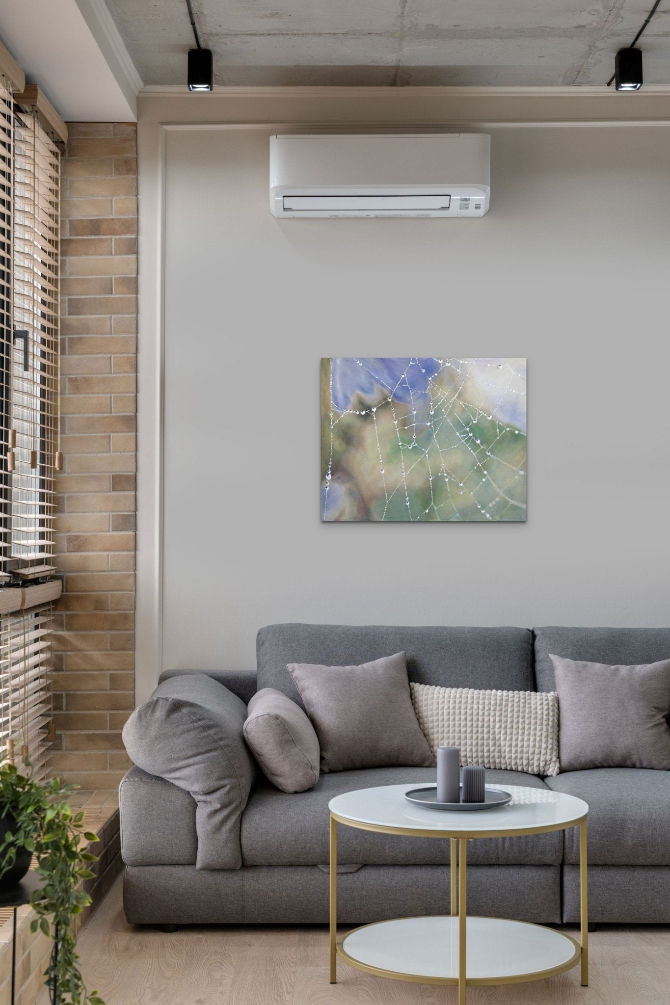 Realistic Painting adds emotion, life, & color to this monochrome living space