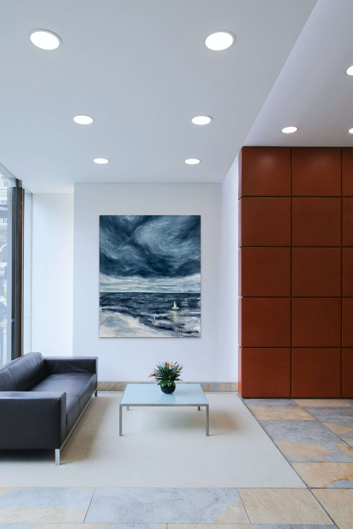 Seascape Abstract Painting with blue waves is energy to this contemporary waiting area