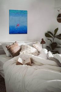 Bold Contemporary Blue Ocean Art compliments this bedroom with color and life