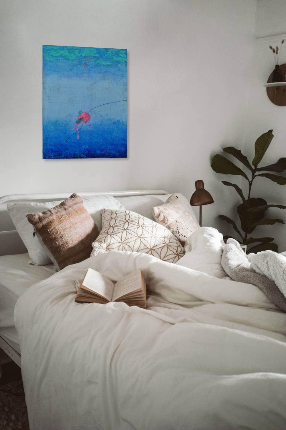 Bold Contemporary Blue Ocean Art compliments this bedroom with color and life