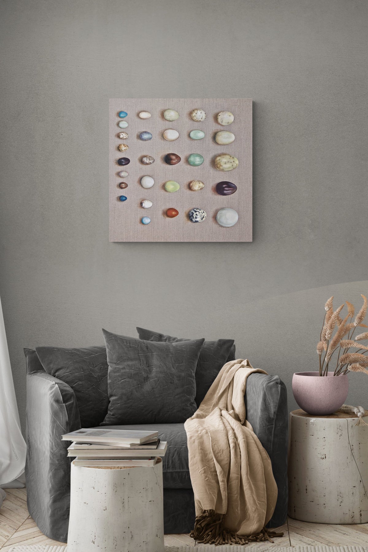 Contemporary Seaside Painting with bird eggs adds nature to this cozy living space