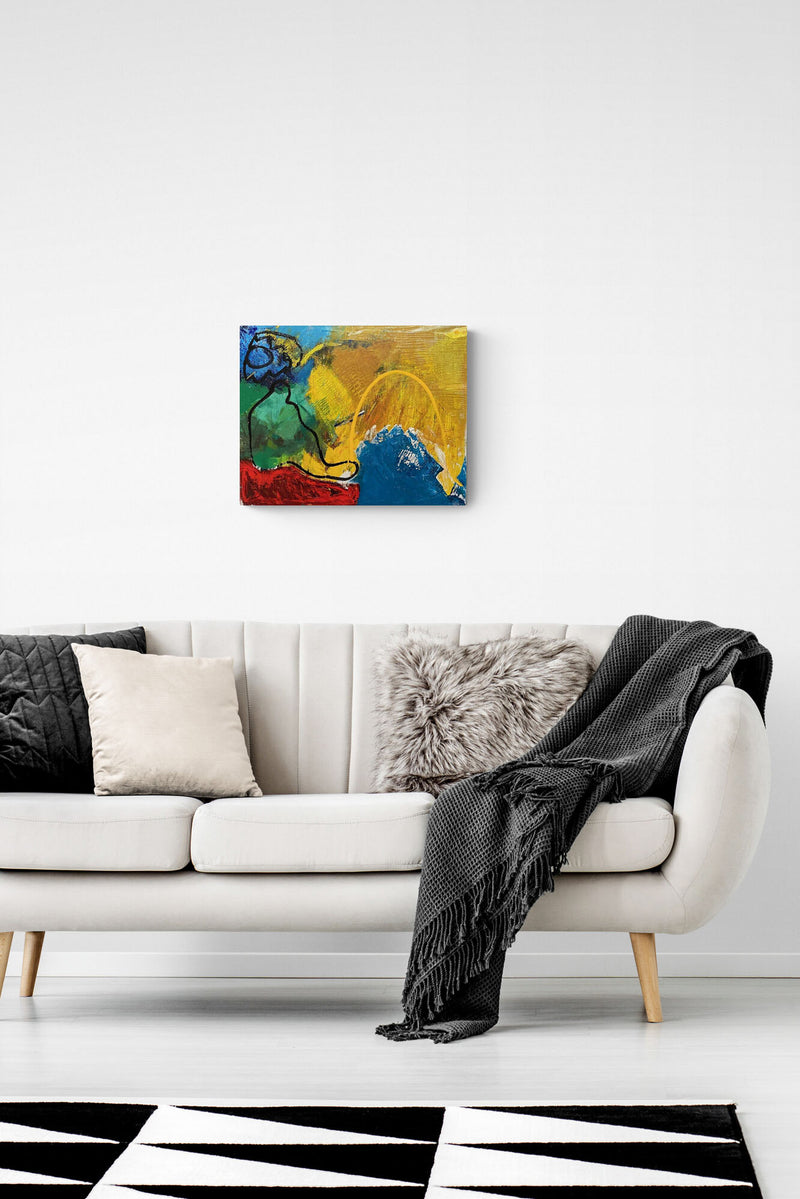 Contemporary abstract art fills this living space with vibrant blue, red and yellow colors
