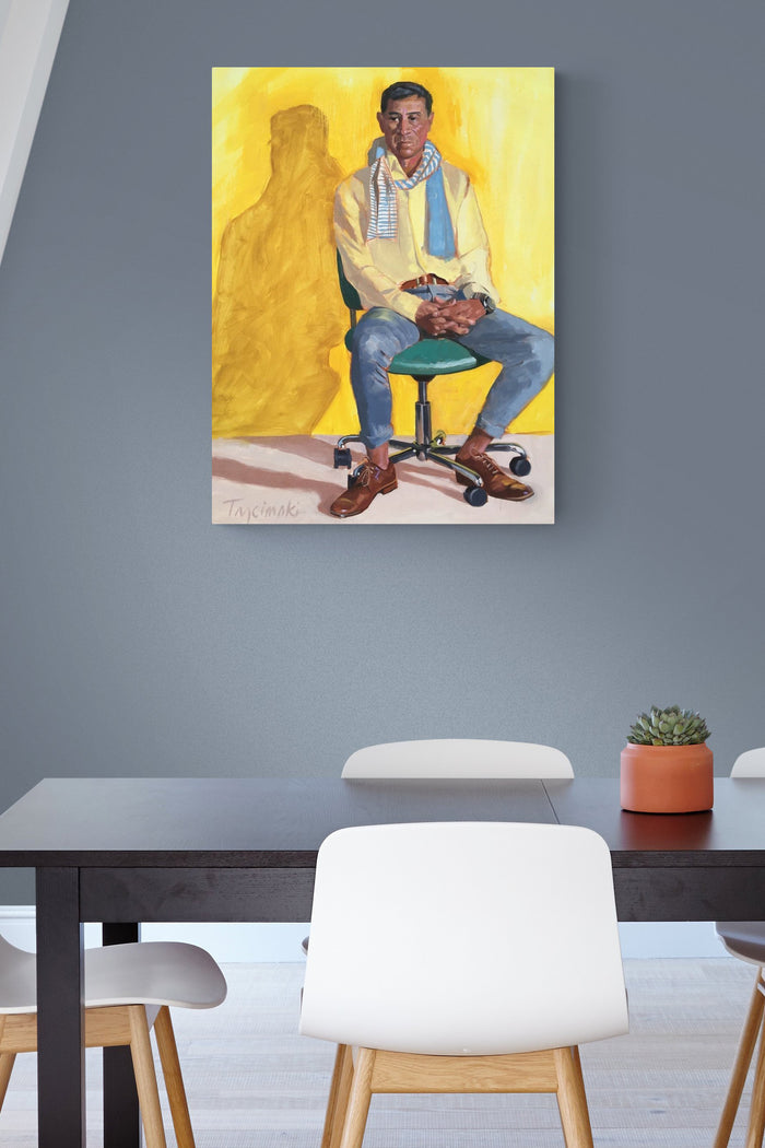 male figurative yellow & blue painting brightens up this simple office space