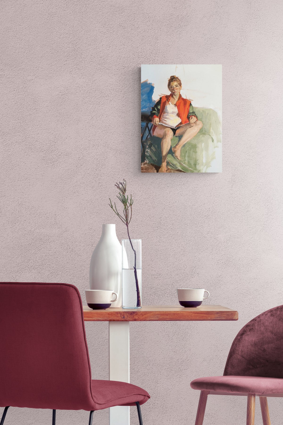 female figurative art with strong red and blue color draws tranquility to this kitchen area