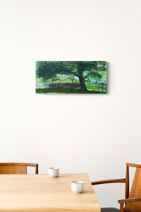 Contemporary Landscape Painting with rich green colors adds conversation to this kitchen