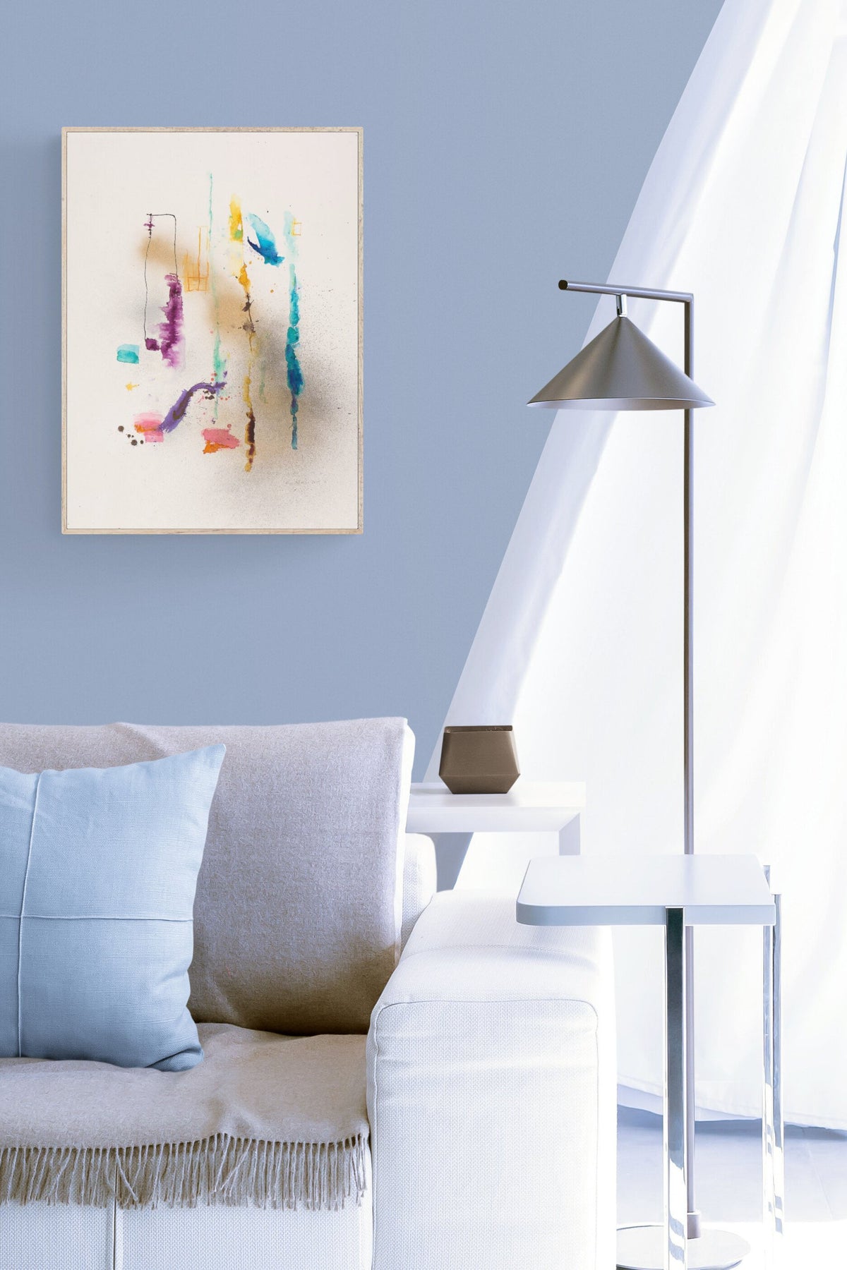 Expressionistic Painting adds color with lyrical rhythms of nature to this soft living room