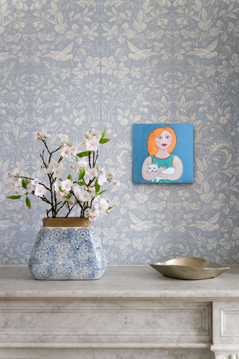 Small Scale Female Figurative Painting adds color & femininity to this living room mantle